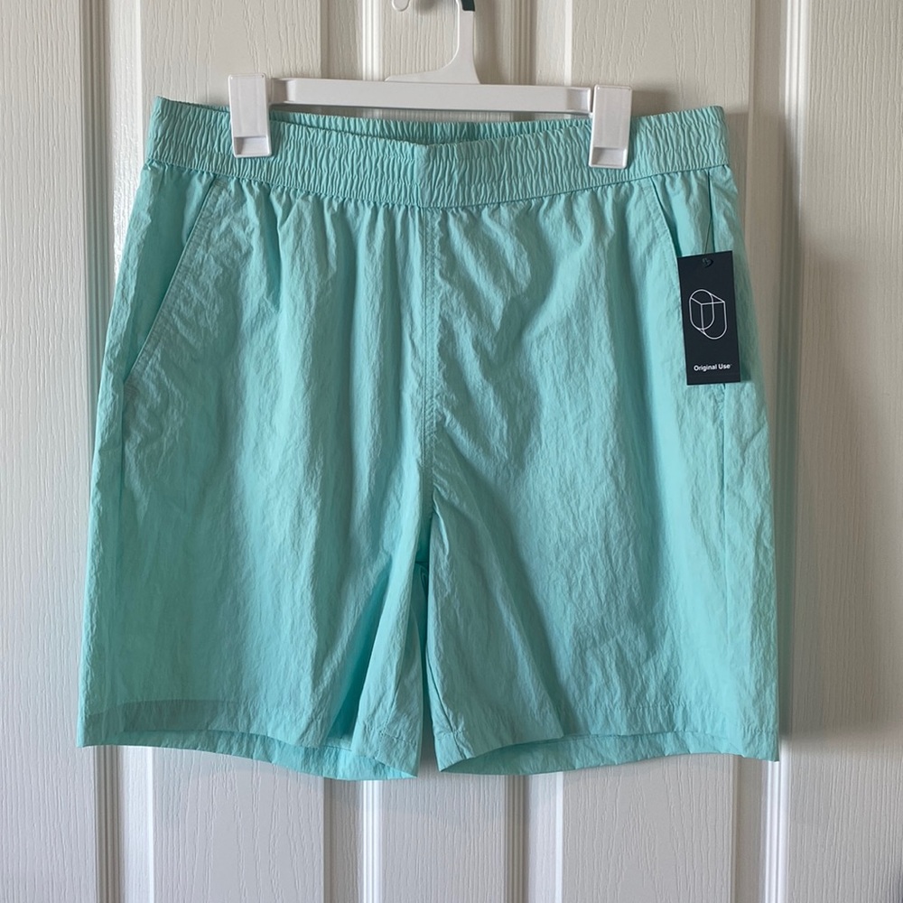 Mens trunks. Nylon, recycled material. Brand new with tags. Mesh pockets.